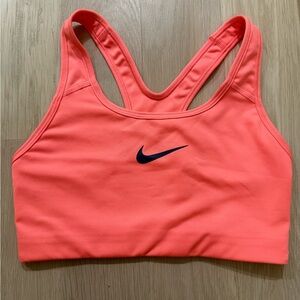Nike bright orangey pink sports bra